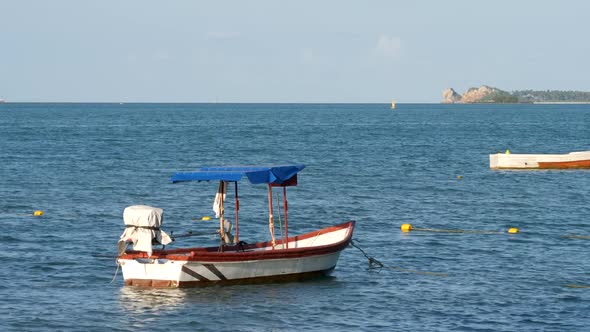 Calm Sea With Small Boat