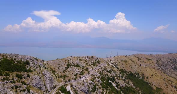 Aerial drone view of a lake in Montenegro alt