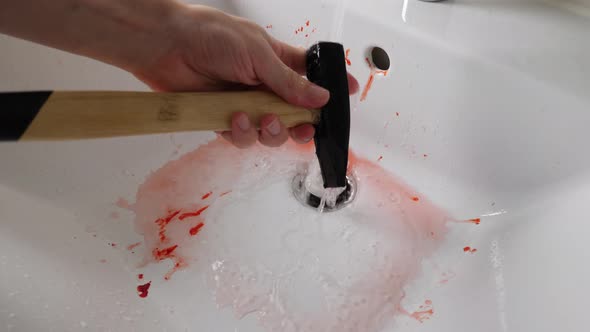 A Bloody Murder Weapon being Washed by Serial Killer, 4K, Fake Blood alt