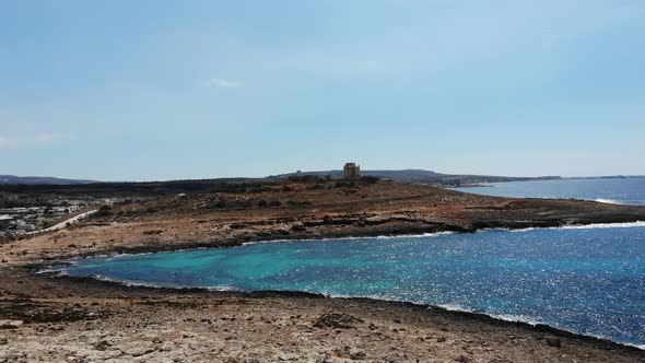 Aerial view towards Coral Beach, White Tower in Mellieha Armier Bay, Malta alt