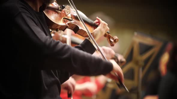 Person performing on a violin