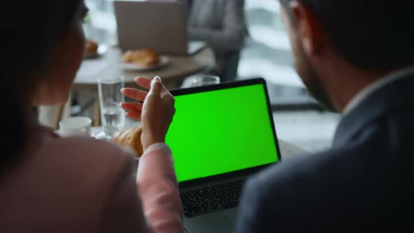 Business Couple Video Chatting on Laptop Chroma Key Screen in Cafe Coworking alt