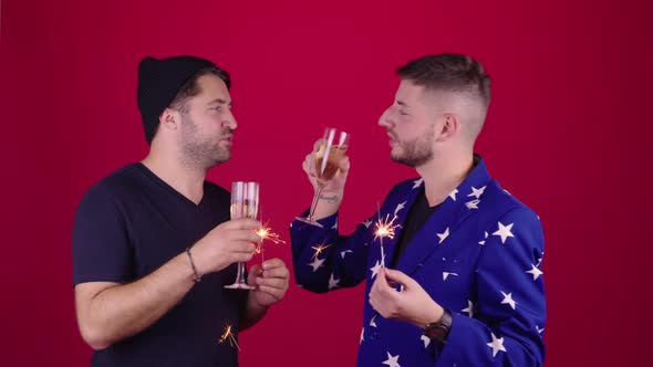 Two Stylish Gay Men with Sparklers Champagne Celebrating New Year Xmas Holiday