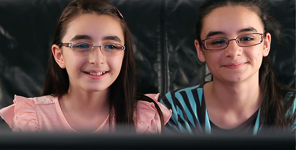 Happy Girls Watching TV  alt