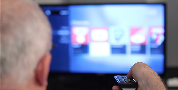 Senior Man Hand Pressing Remote Control 3 alt