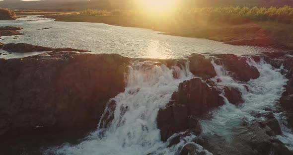 Glanni Waterfall at Sunrise in Iceland alt