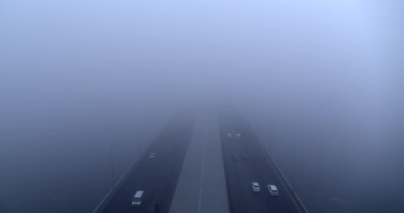 Bridge and Highway Downtown in Heavy Fog Aerial View alt