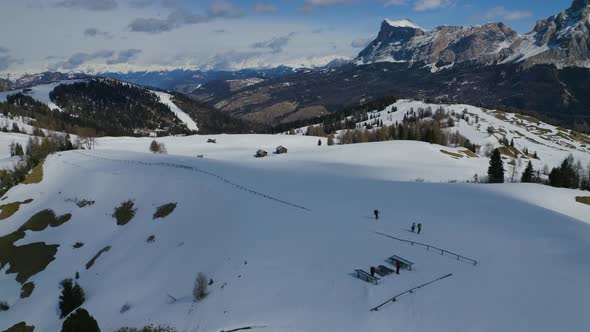 Aerial, Winter Landscape In Dolomites Mountains On A Sunny Day In Italy