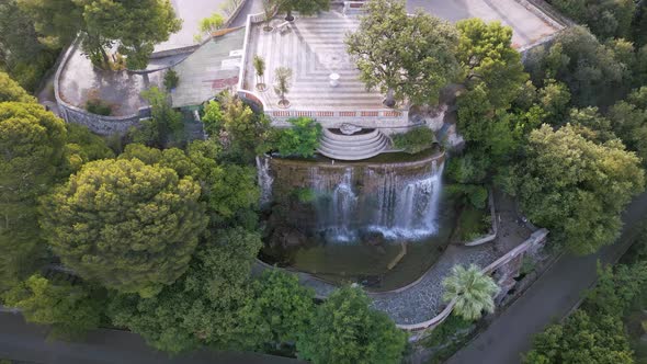 Drone shot of Cascade Dijon, artificial waterfall at Castle Hill, Nice, France alt