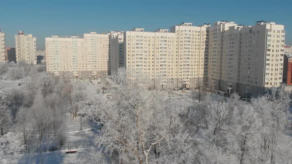 Flying Over City Park in Winter and Moscow, Russia