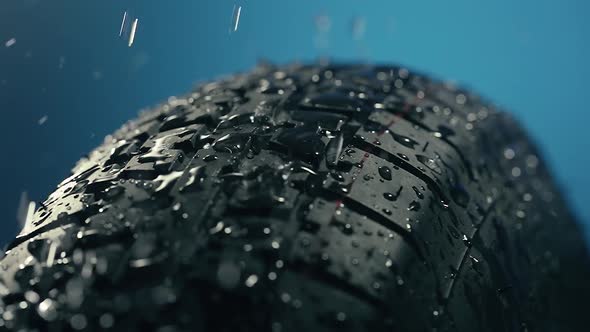 Water Dripping on a Car Tire alt