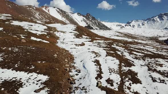 Autumn Mountains Covered with Snow in Places alt