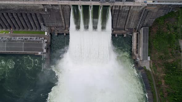 Aerial Top Down View of Water Discharge at Hydroelectric Power Plant of Krasnoyarsk City Siberia alt