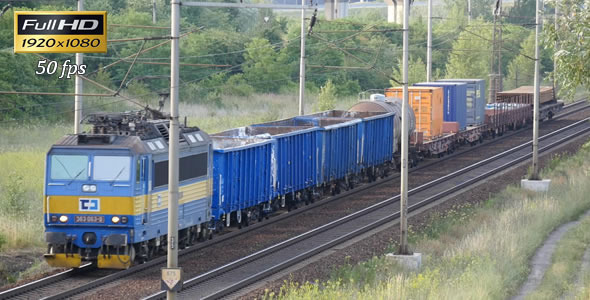 Freight Train Passes Through the Countryside