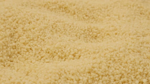 Tilting over steamed balls of semolina traditional north African food 4K 2160p 30fps UltraHD video - alt