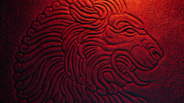 Fire Illuminates Lion Rock Carving alt