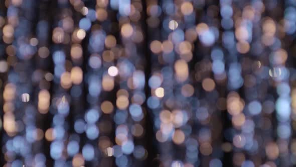 Bokeh Out of Focus Golden, Blue Lights Defocused Abstract Background alt