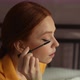 Closeup Tracking Shot of Attractive Redhead Young Woman Paints Mascara Eyelashes Yourself Looking to - VideoHive Item for Sale