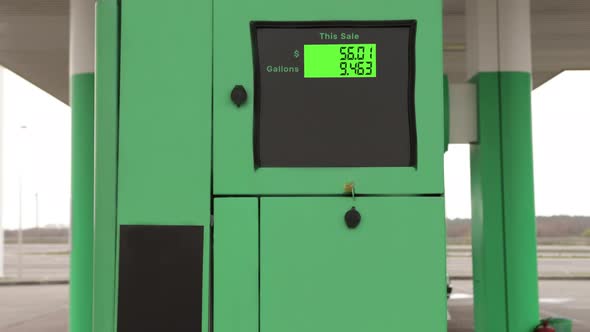 A Gasoline Meter Counter Price at Gas Station Close Up Moment While Refueling a Car Prices Rising alt