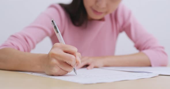 Student doing revision at home alt