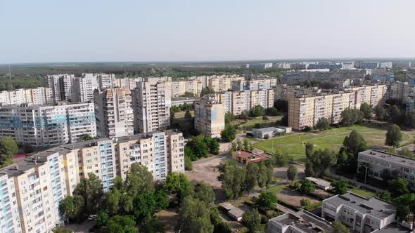 Aerial Panorama of Dwelling Blocks of Multistory Buildings Near Forest alt