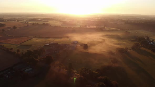 Farm In Beautiful Atomsphric Misty Valley Warwickshire England Sunrise