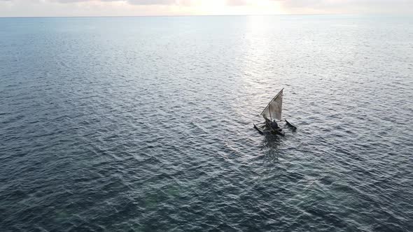 Aerial View of a Boat in the Ocean Near the Coast of Zanzibar Tanzania alt