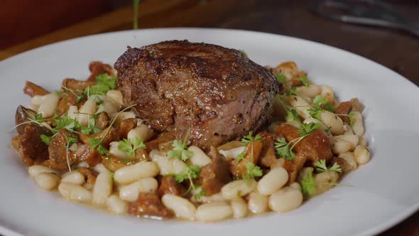 Professional chef cooking in kitchen. alt