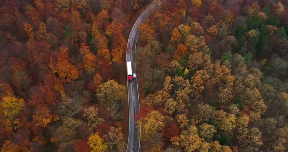 Following Truck on Country Road Aerial View 4K