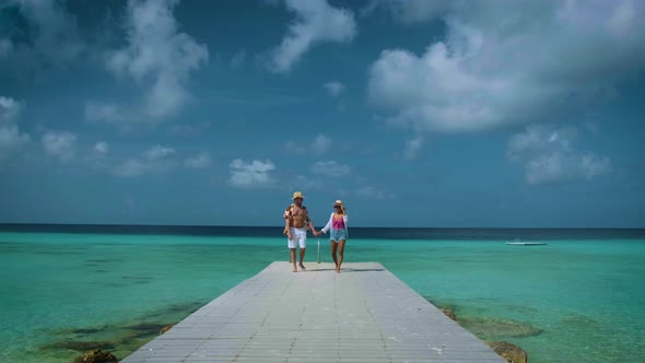 Couple Men and Woman Mid Age on the Beach of Curacao Grote Knip Beach Curacao Dutch Antilles alt