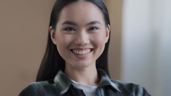 Closeup Female Face with Perfect Skin and Natural Makeup Looking at Camera with Friendly Sincere alt