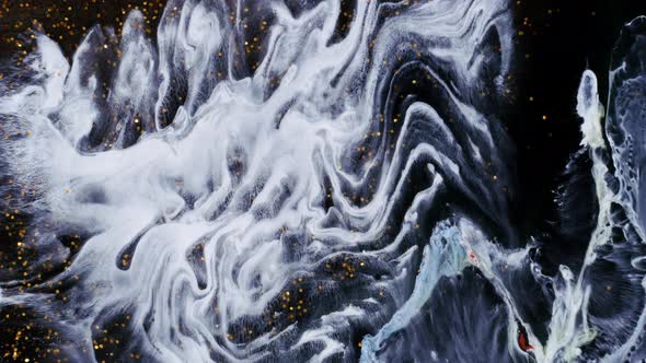 Drop of White Paint Spreads Through the Veins and Covers It with a Wave on a Golden Shimmering alt