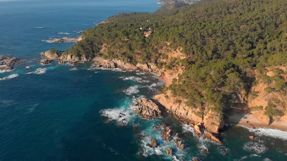 Aerial landscape footage in Costa Brava coastal near town Palamos, Spain alt