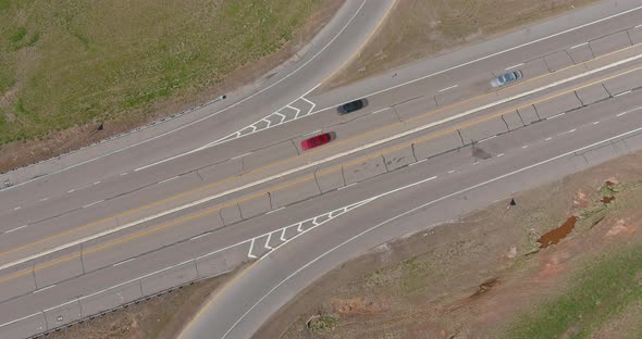 Aerial view over highway interchange driving along the freeway alt