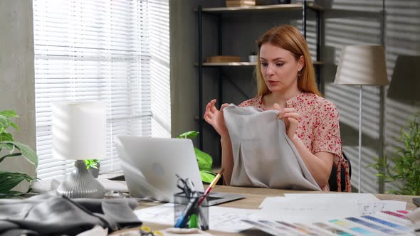 Happy Young Business Woman Designer Using Laptop Taking Online Shop Orders in Atelier Office alt