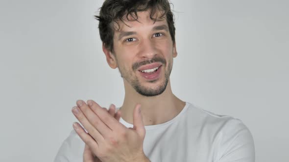 Portrait of Applauding Young Casual Man Clapping in Excitement alt