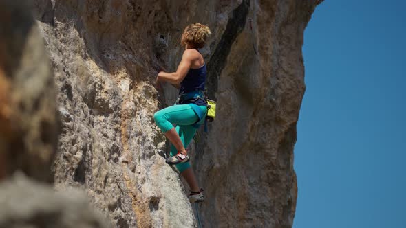 Cinematic Slow Motion Rock Climbing Moments Strong Female Rock Climber Lead Climbing on Outdoor alt
