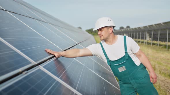 Portrait of Proud Worker Industrial Engineer in Uniform Standing on Field with alt