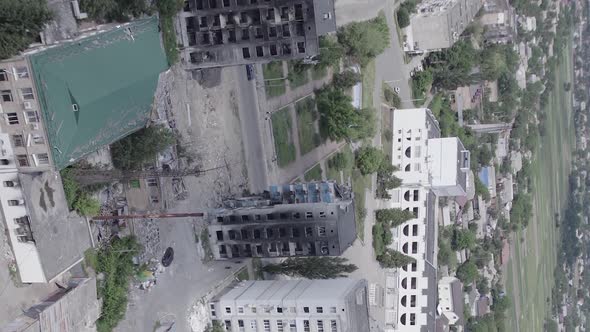 Vertical Video of the Consequences of the War in Ukraine  a Destroyed Building alt