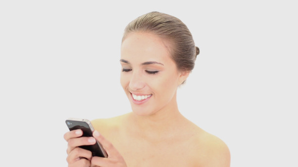 Beautiful Model Texting On Her Smartphone 2 alt