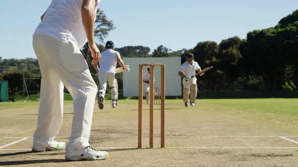 Bowler Running out a layer during cricket match alt