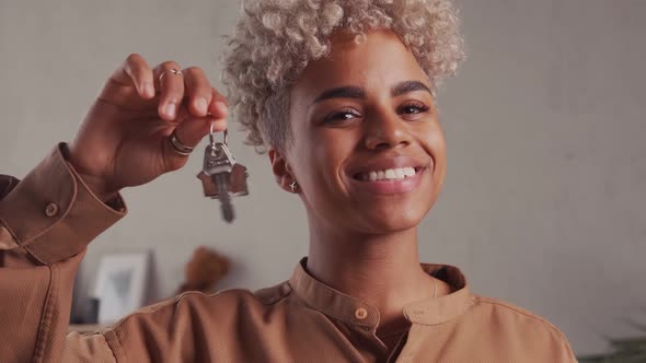 African Woman Show Praise House Keys Moving to First Own New Apartment or House alt