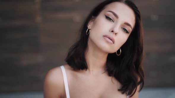 Closeup with Portrait of Wellgroomed Young Beautiful Young Woman alt