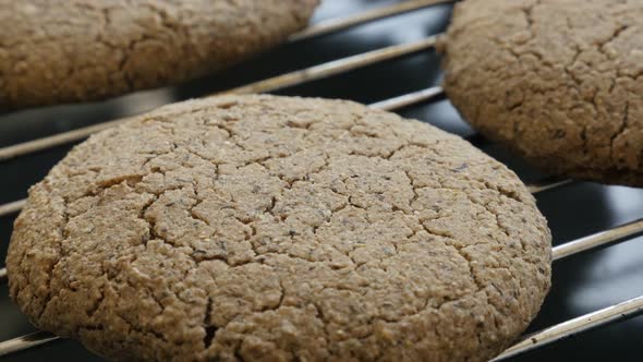 Homemade cookie surface   close-up 4K 2160p 30fps UltraHD tilting footage -  Buckwheat bread product alt