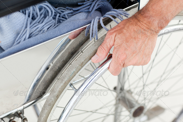 Man in his wheelchair - Stock Photo - Images