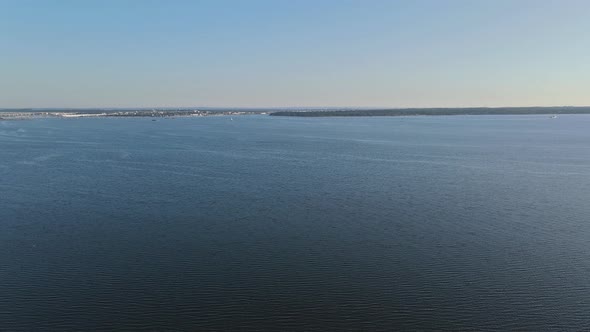 Panoramic Aerial View of the Coastal Area on Pier with Ocean Along alt