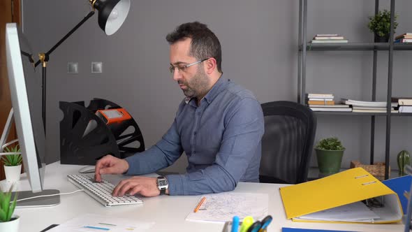 Successful and happy office worker. alt