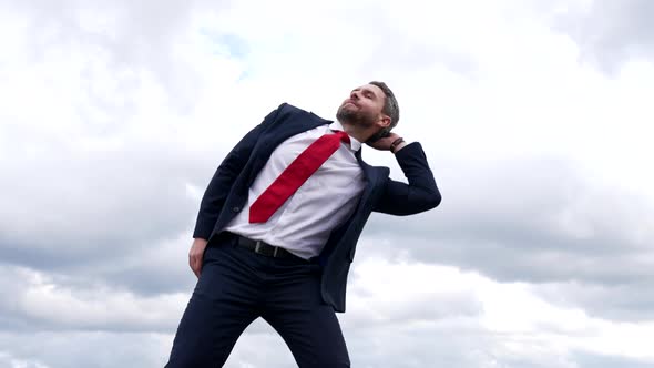 Successful Businessman Man in Formal Suit Happy Dancing in Cloudy Sky Dance