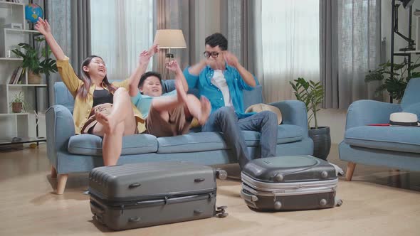 Asian Family Helping Close Suitcase And Relax For A New Journey. Luggage For Travel Holidays alt