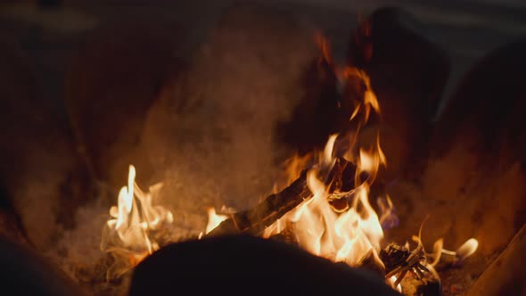 Fire Burns in Special Bowl at Night Closeup Slow Motion alt